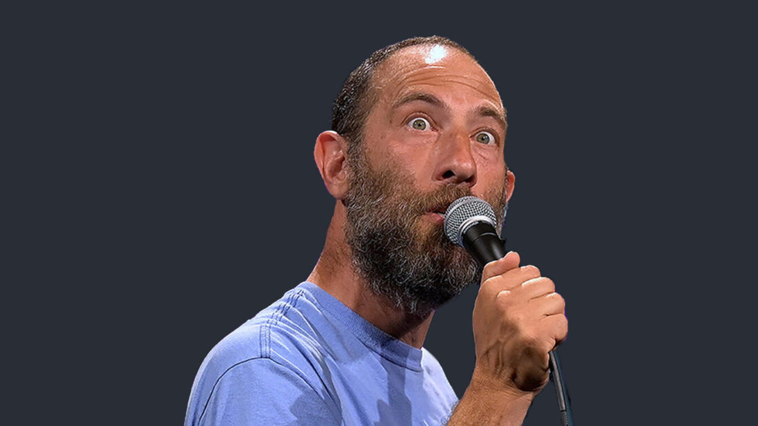 Ari Shaffir performing stand-up comedy.