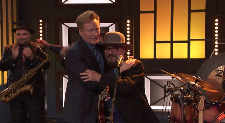 Conan says goodbye to his longtime late night band as he transitions show to half-hour format