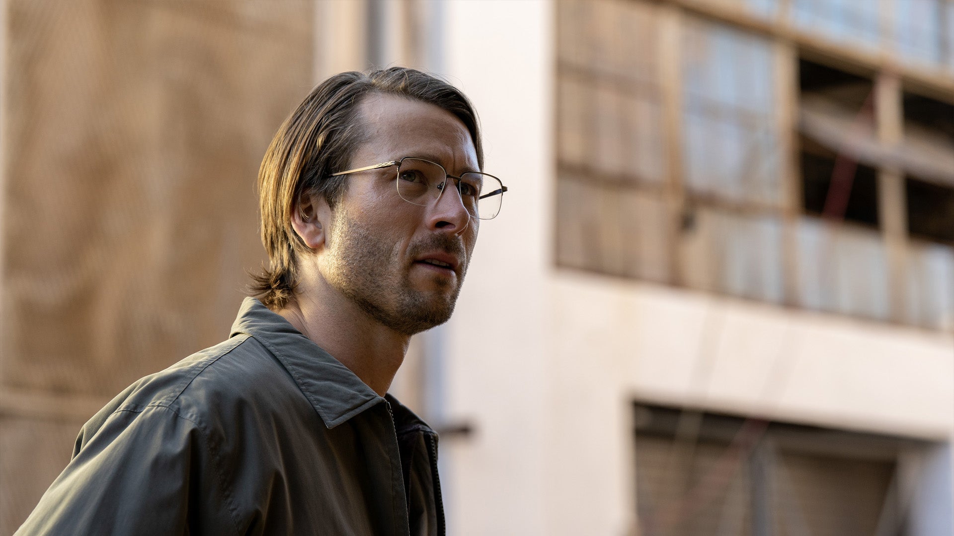 Glen Powell Is A Man Of Many Faces In Trailer For Richard Linklater's "Hit Man"