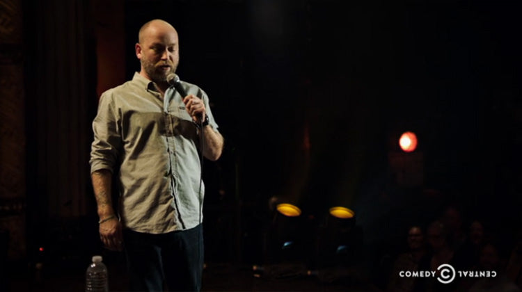 It looks like Kyle Kinane is no longer the voice of Comedy Central