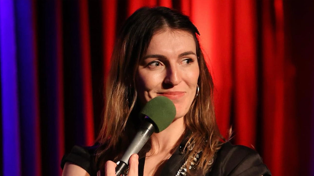 Melanie Bracewell performing stand-up comedy.